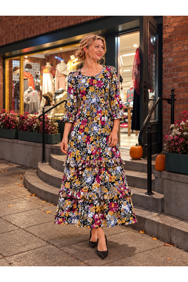 MD13277D-PL / Celeste Design<br/>A charming plaid tiered dress featuring a flattering scoop neck line, 3/4 sleeves with ruffle cuffs, and delicate bow ac